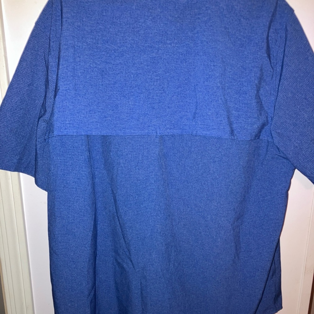 Antigua button up polo , size L , blue , new condition